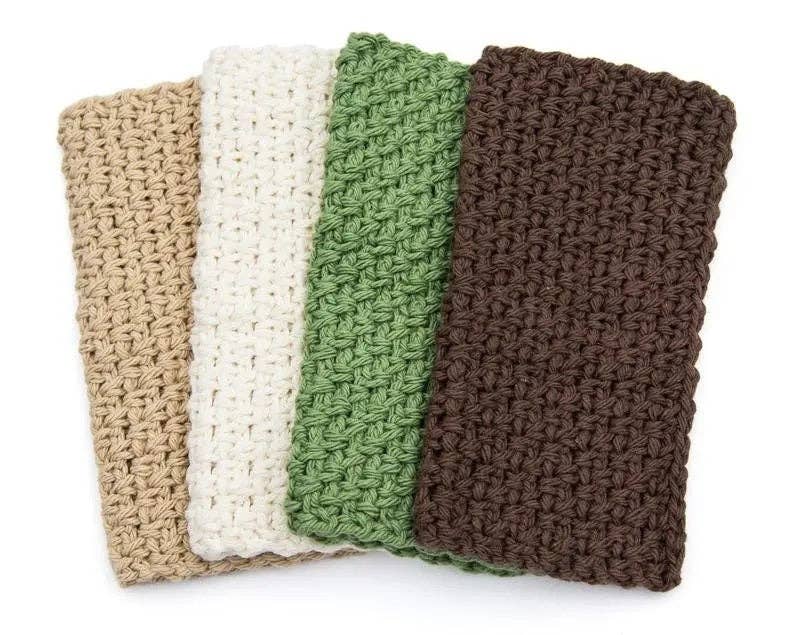 Four crocheted dishcloths in beige, white, green, and brown on a white background