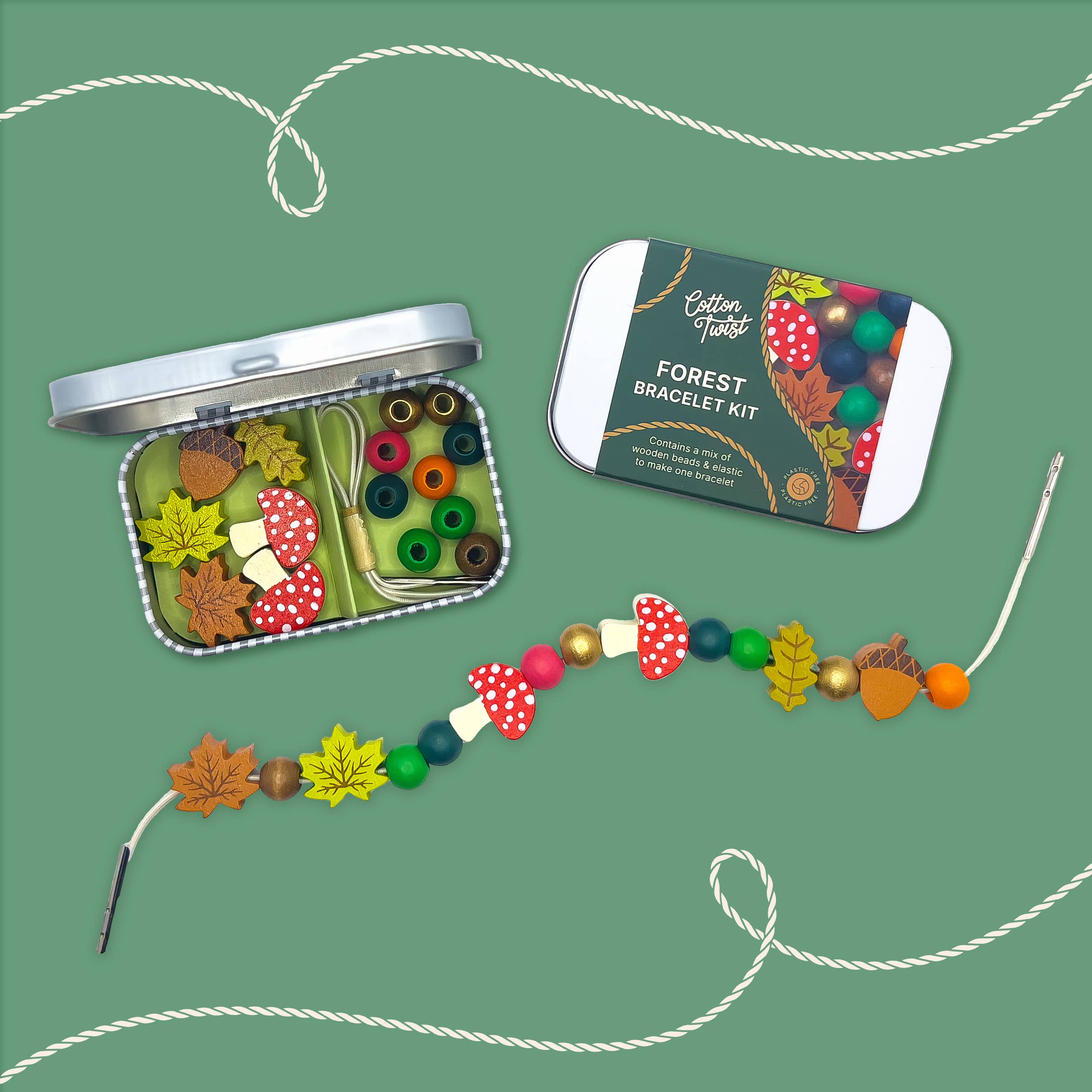 Forest-themed bracelet kit with beads and packaging on a green background