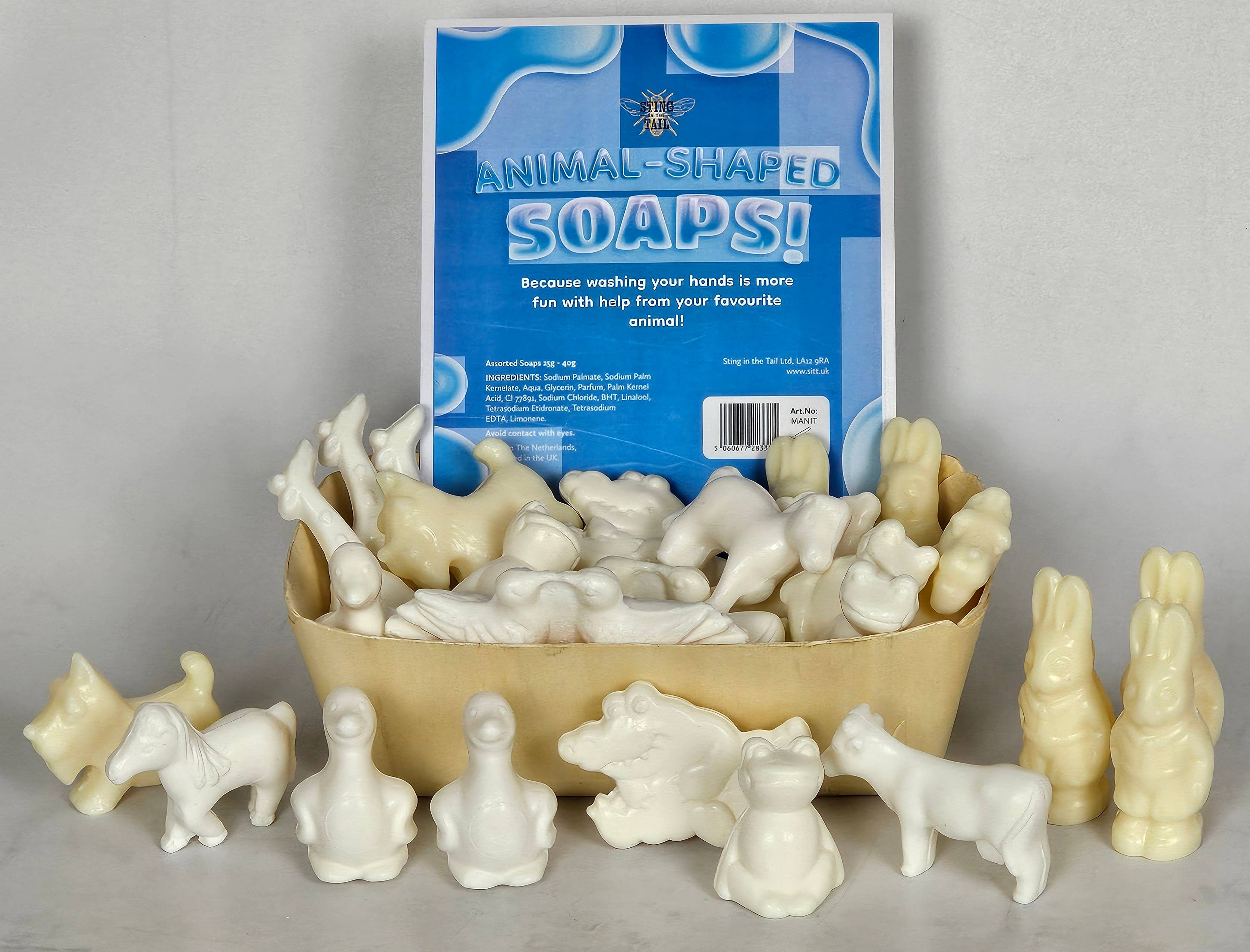 Assorted animal-shaped soaps with a box labeled 'Animal-Shaped Soaps' on a gray background.