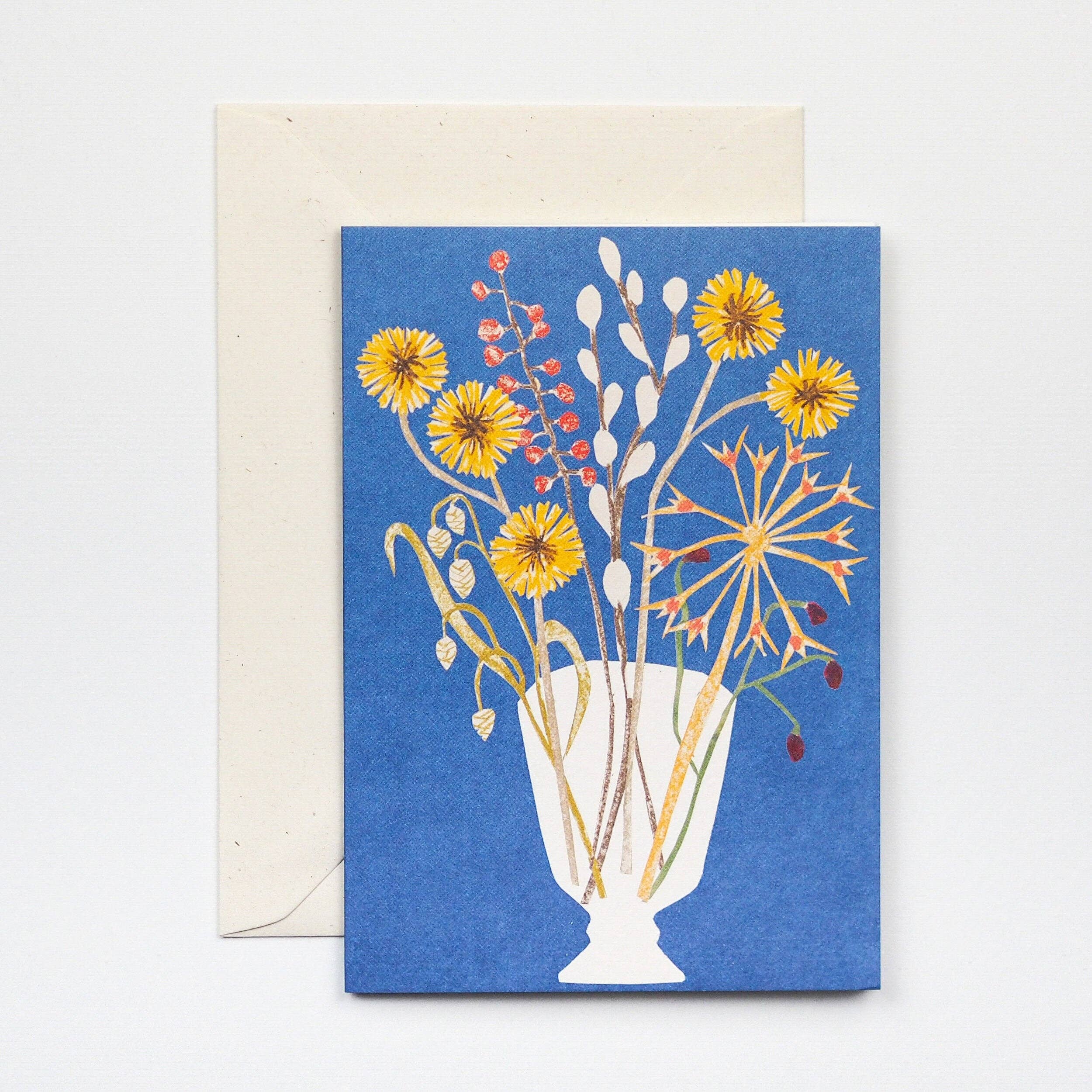 Greeting card with floral design on a blue background