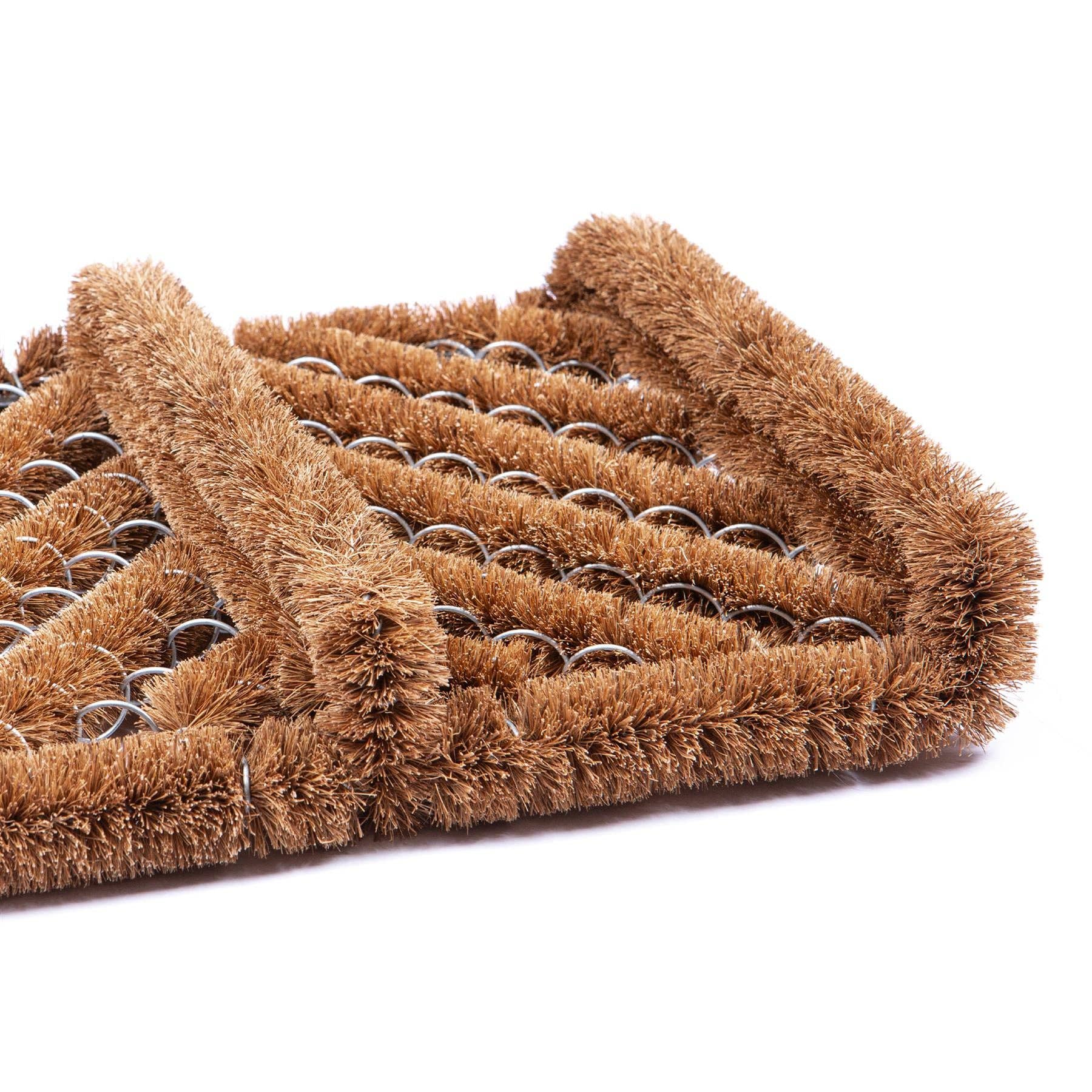 Brown doormat with metal rings on a white background