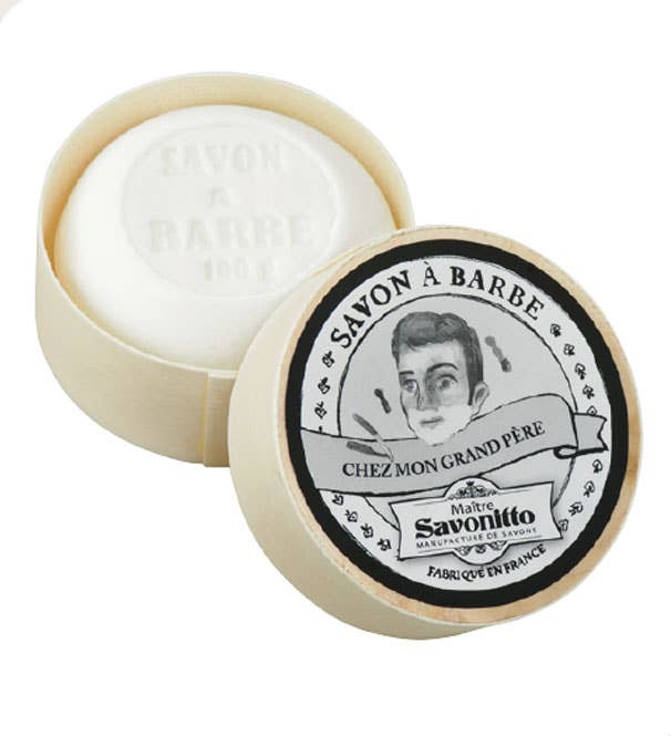 Barber soap in a wooden container with branding on a white background