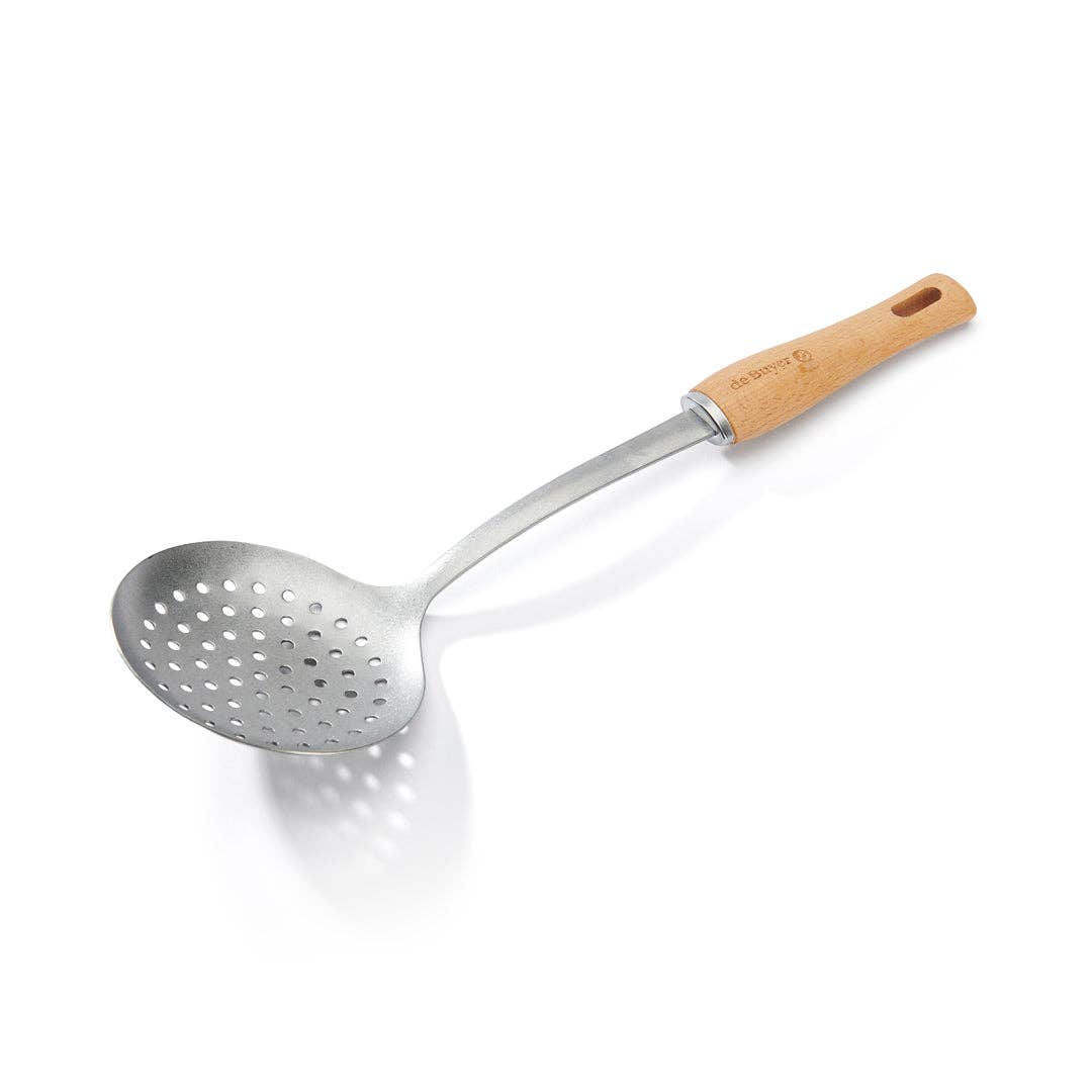Metallic slotted spoon with wooden handle on a white background