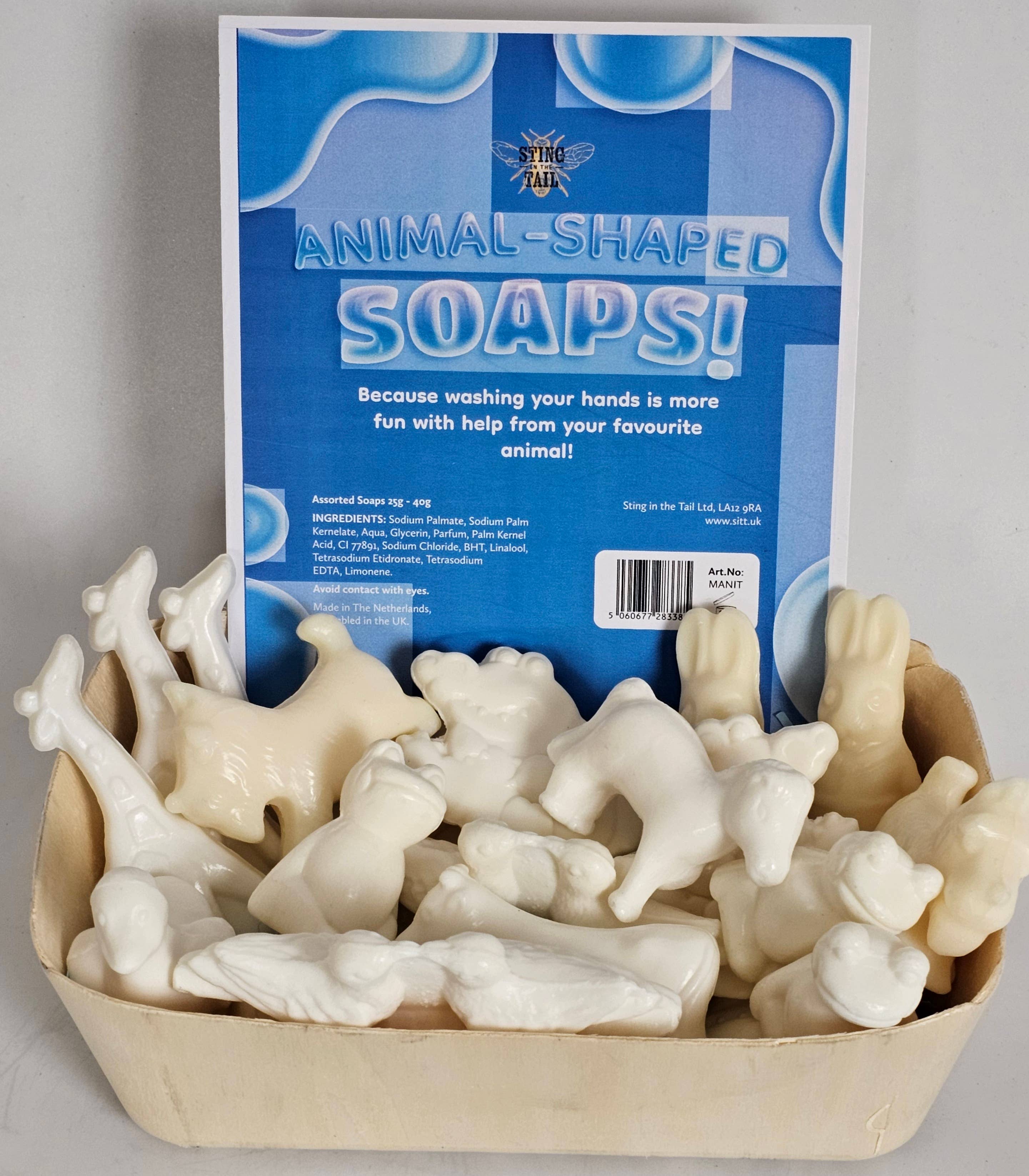 Box of animal-shaped soaps with a blue label on a gray background