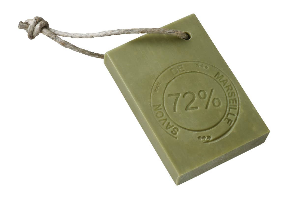 Green soap bar with '72% Marseille' text on a white background