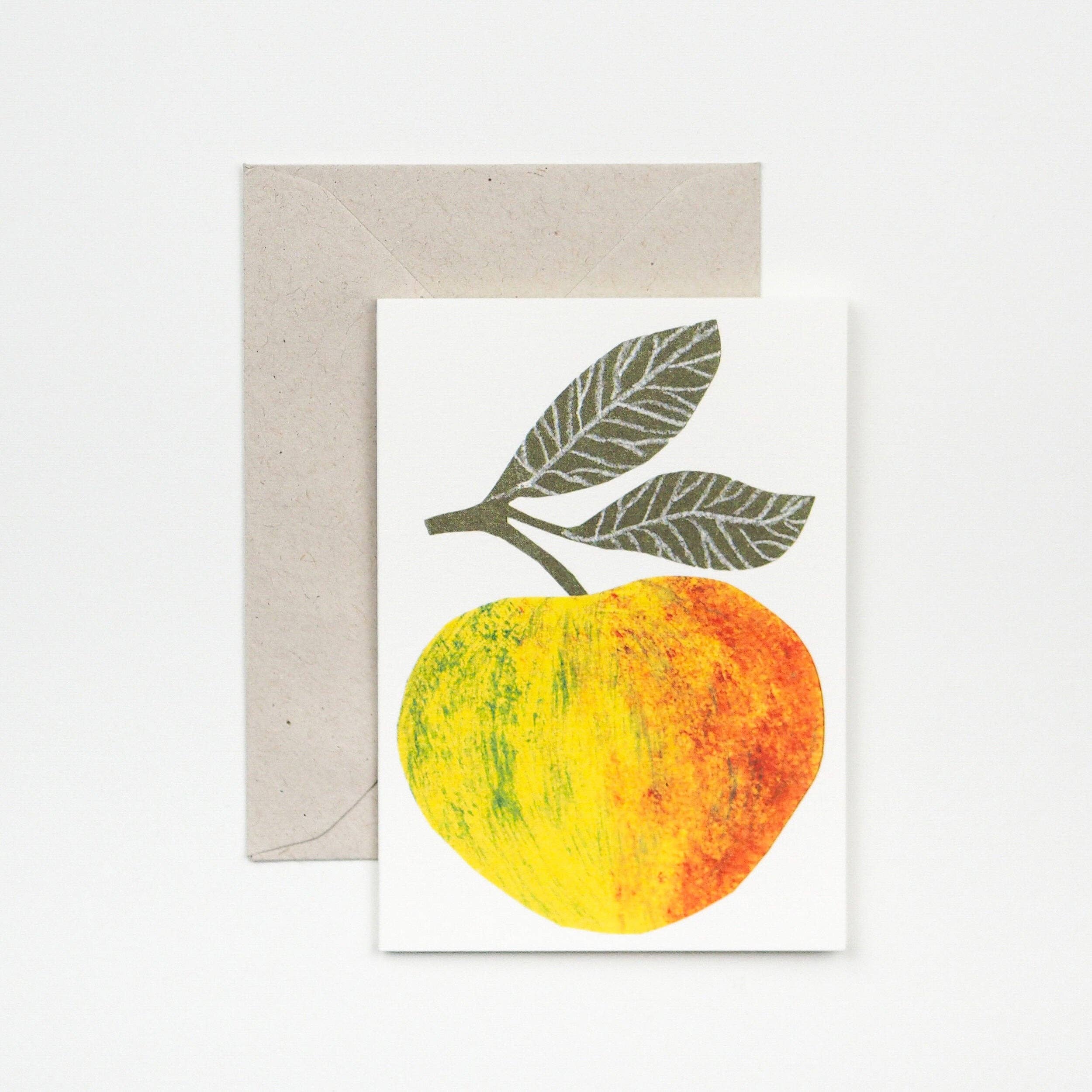 Greeting card with a yellow and orange fruit design on a white background