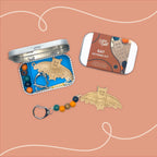 Bat keyring kit with bat-shaped keychain and packaging on a peach background