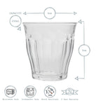 Clear glass tumbler with measurements and safety features on a white background