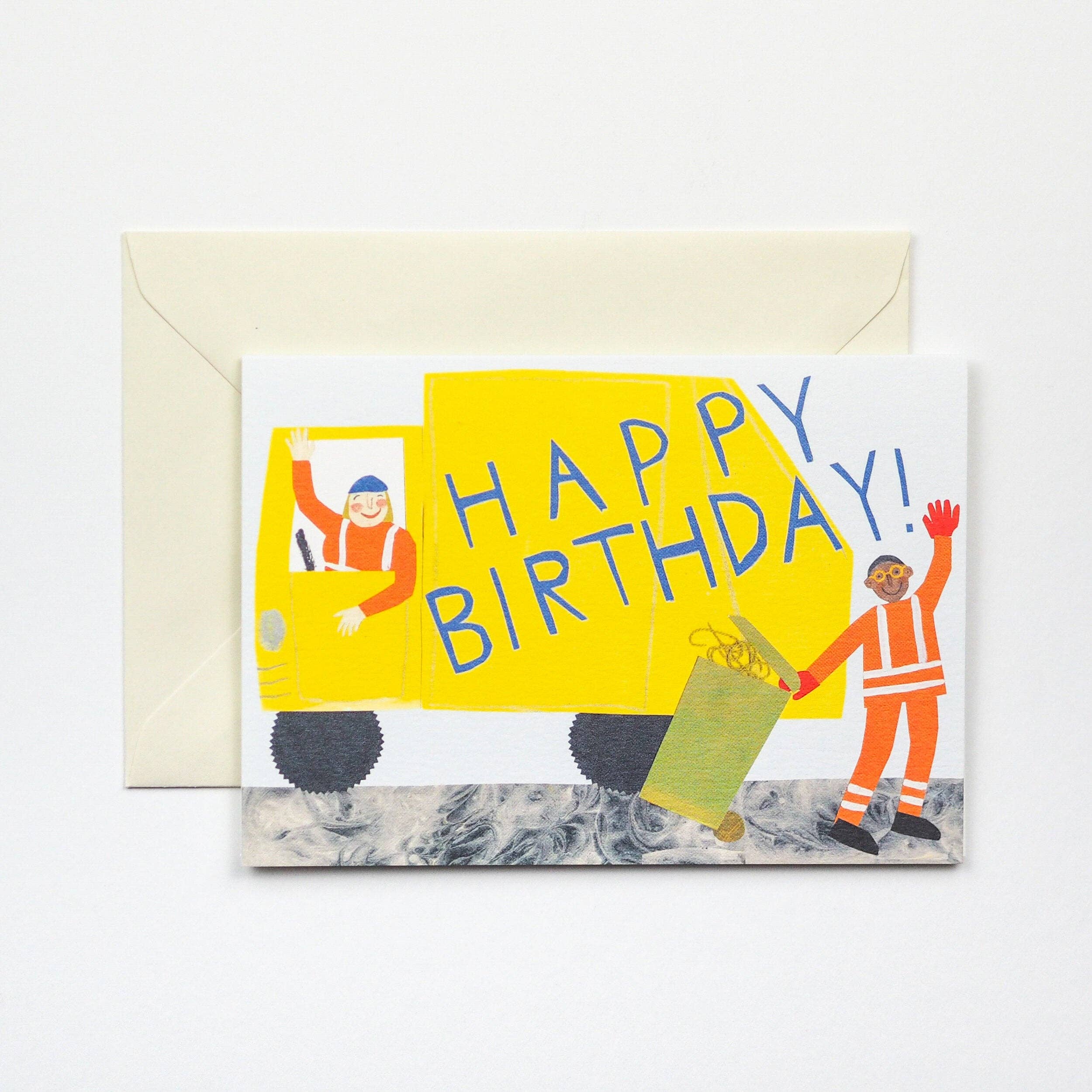 Birthday card with illustration of a character in a vehicle and 'Happy Birthday!' text, with a yellow envelope.