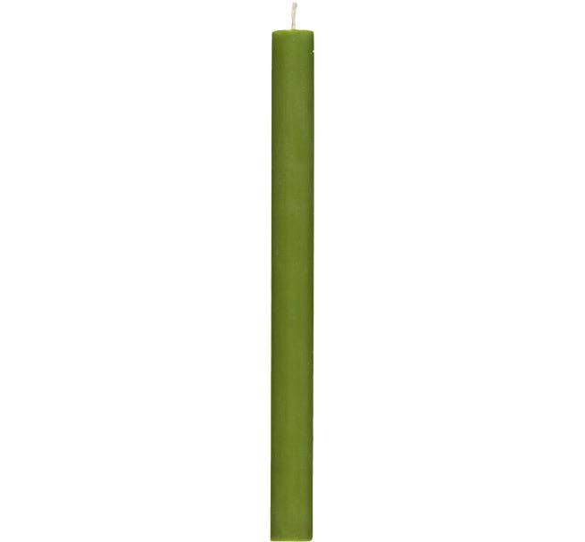 Green candle on a white background