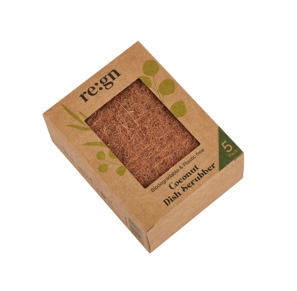 Coconut dish scrubber in a cardboard box with 're:gn' branding on a white background