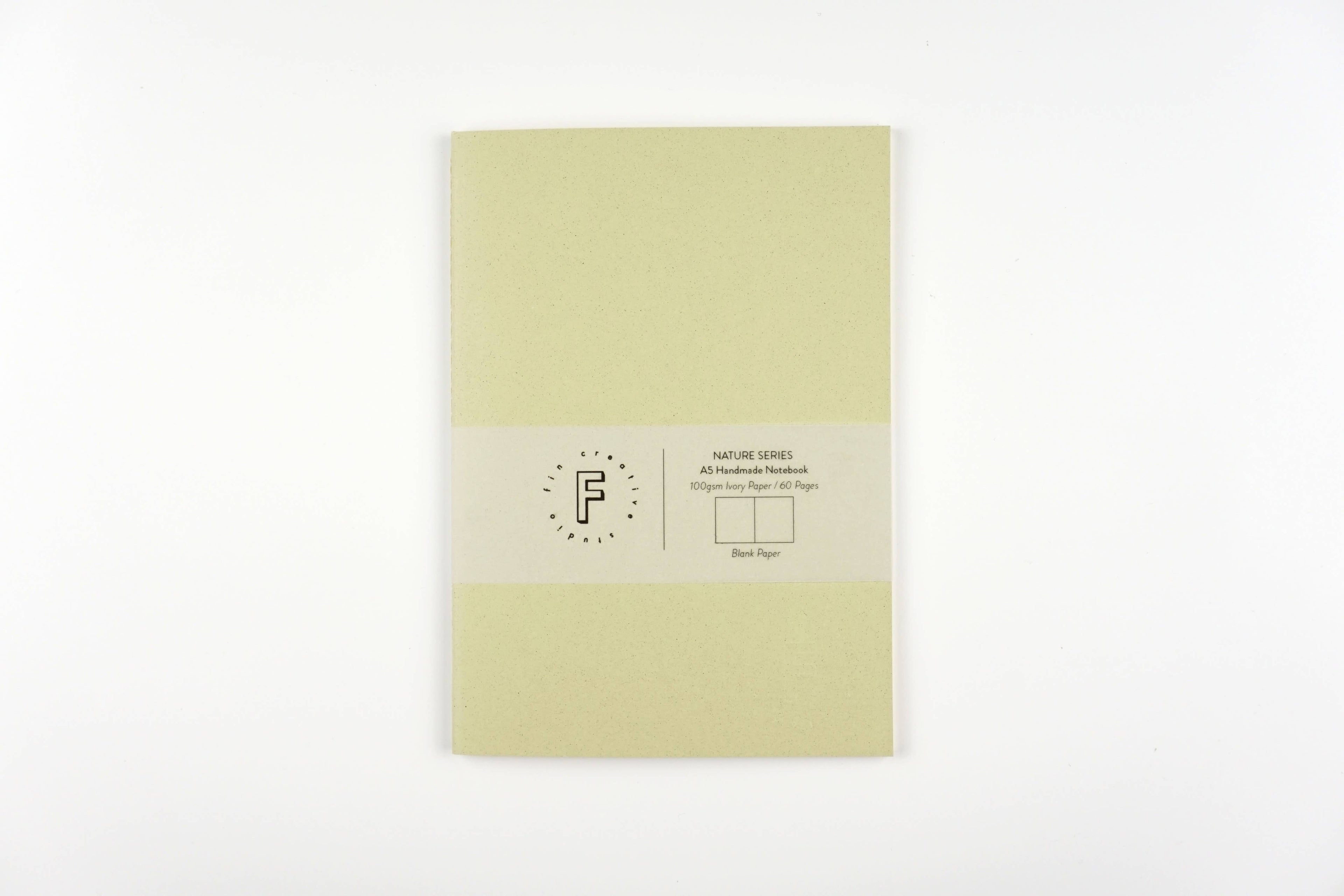 Light green notebook with a brand label on a white background