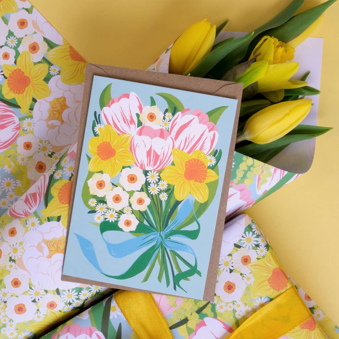 Floral card with a bouquet of flowers on a yellow background