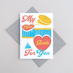 Greeting card with heart design and text 'My Heart Beats For You' on a gray envelope.