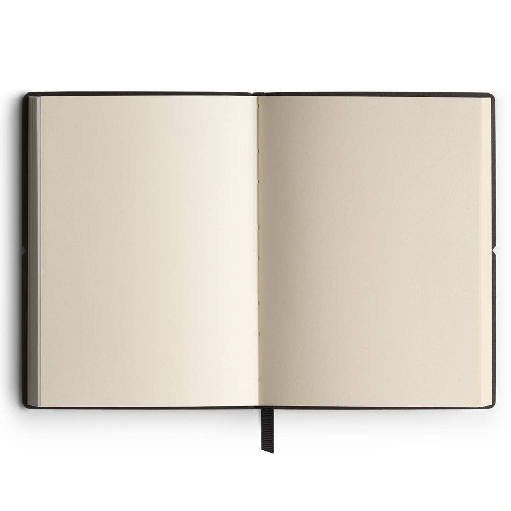 Open notebook with beige pages on a white background