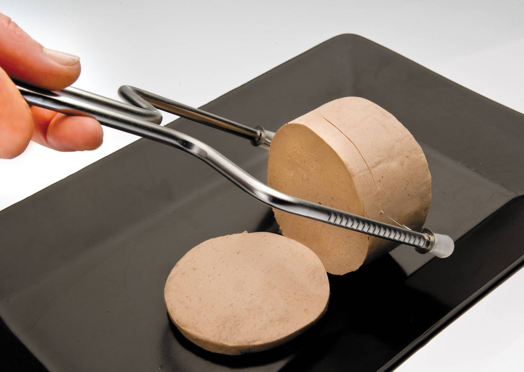 Person using cheese slicer