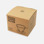 Cardboard box packaging for a reusable coffee filter on a white background