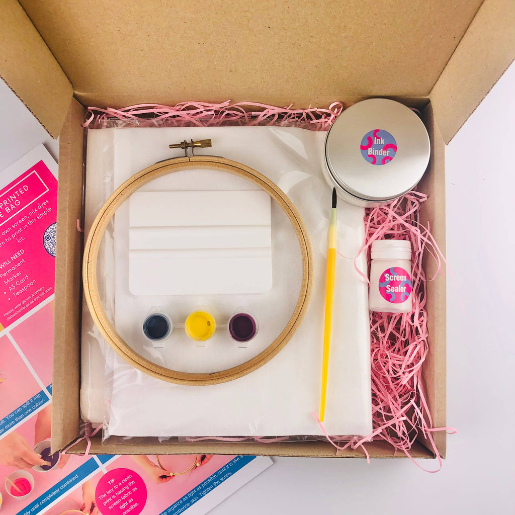 Embroidery kit with hoop, thread, and tools in a box