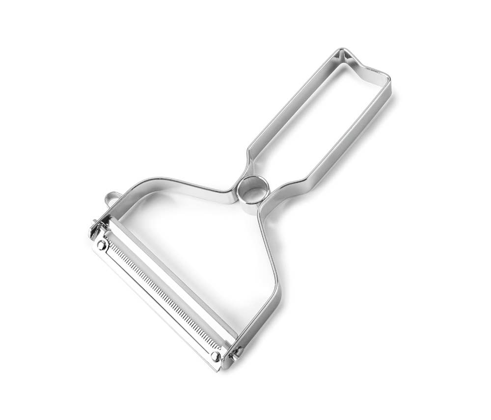Metallic peeler on a white background