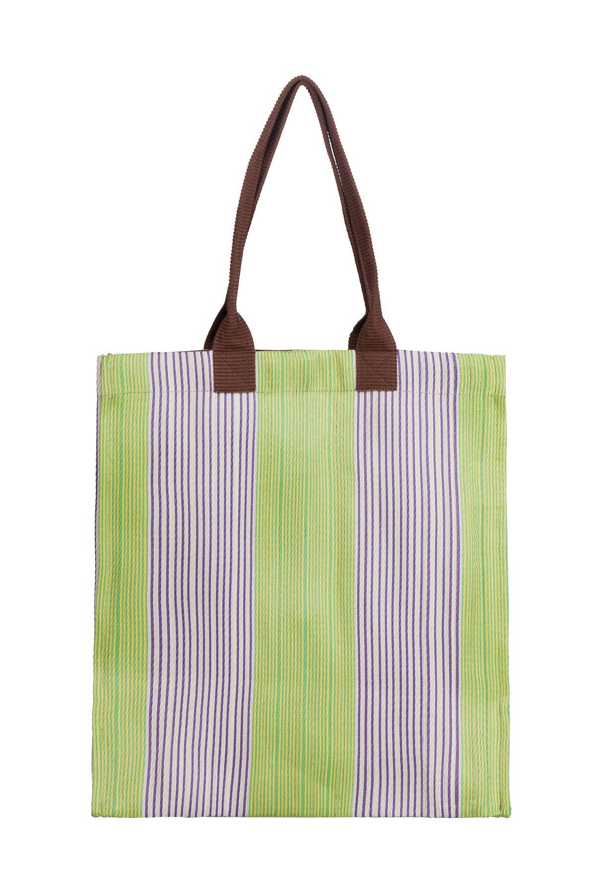 Tote bag with green and purple striped pattern on a white background
