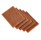 Set of coconut fibre scourers on a white background