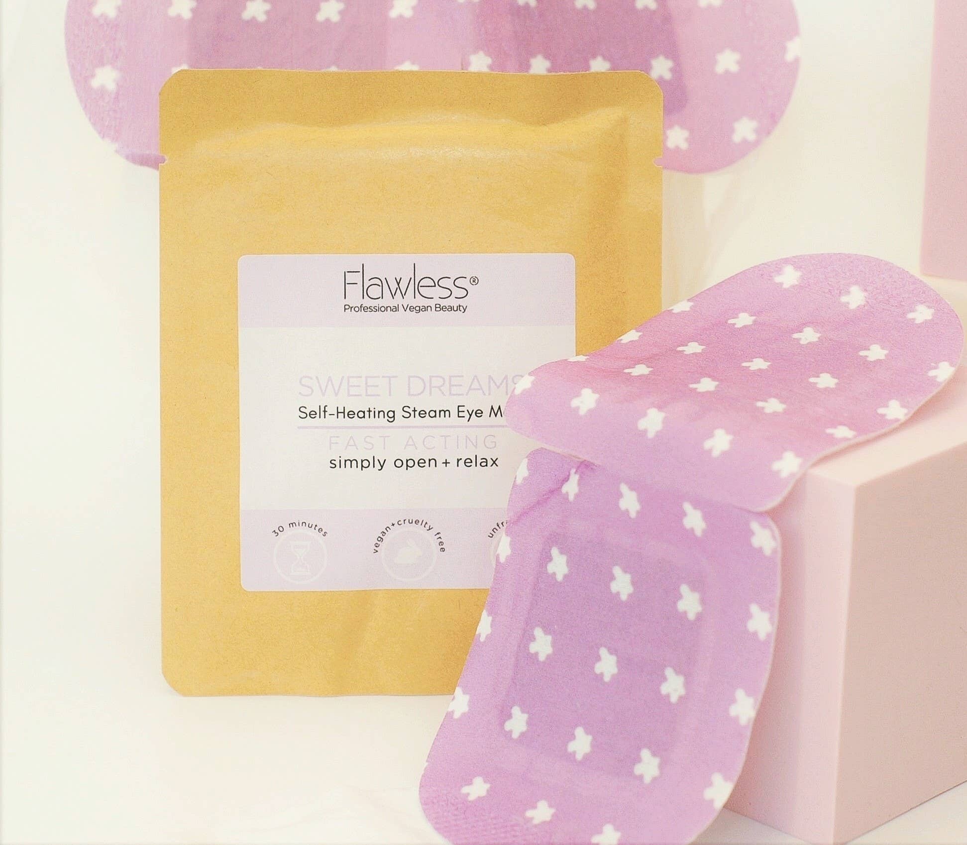 Flawless self-heating steam eye mask with pink packaging and white butterfly pattern on a light background