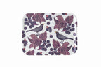 Decorative tray with bird and berry pattern on a white background