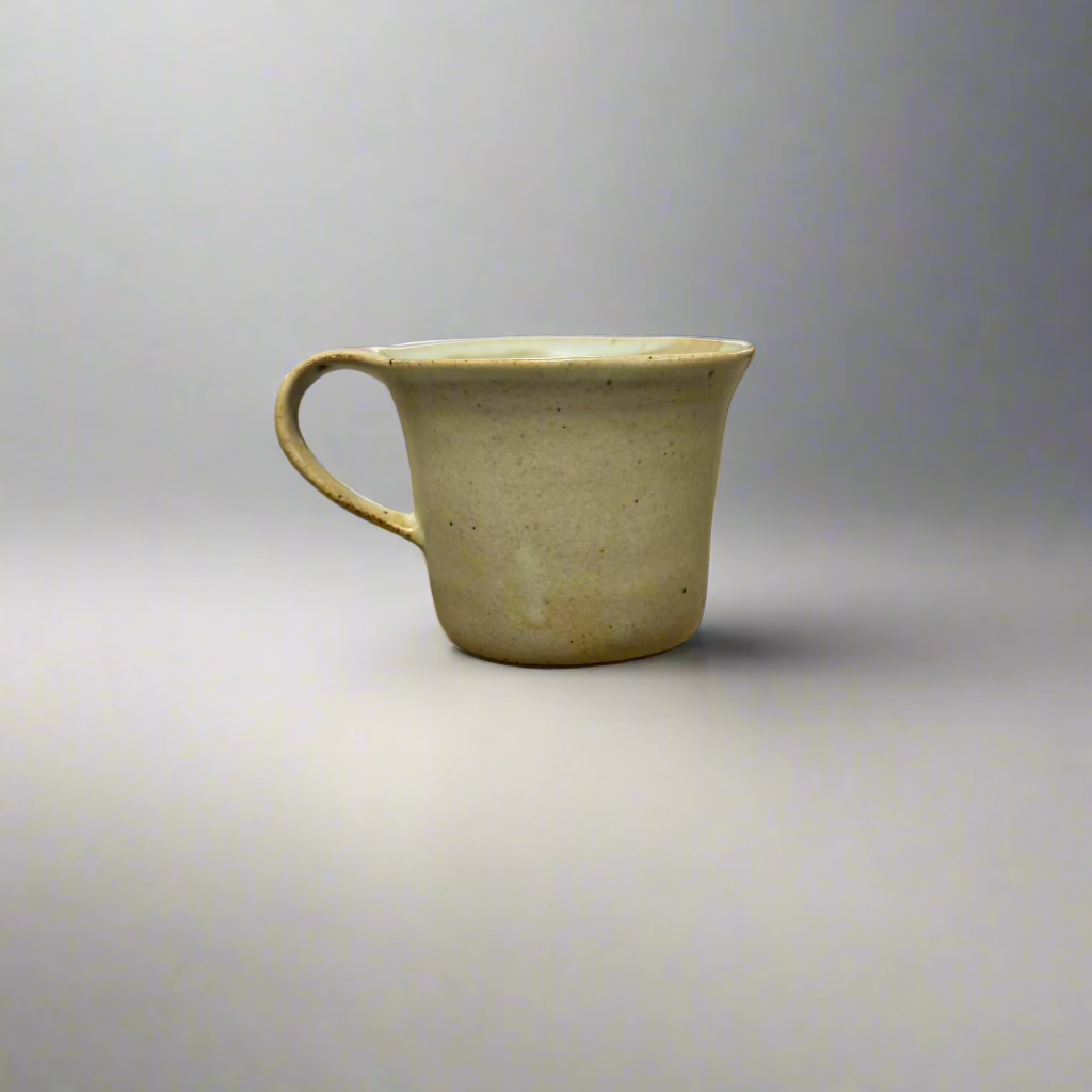 Ceramic mug on a gradient gray background