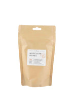 Beige packaging of 'Muscular Aches' with a label on a white background