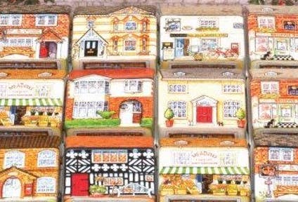 Collection of miniature model houses with different facades and details.