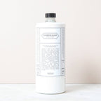 Bottle of 'Alternative Bleach' on a white background