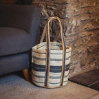 Blue And Ivory Jute Basket bag in a living room