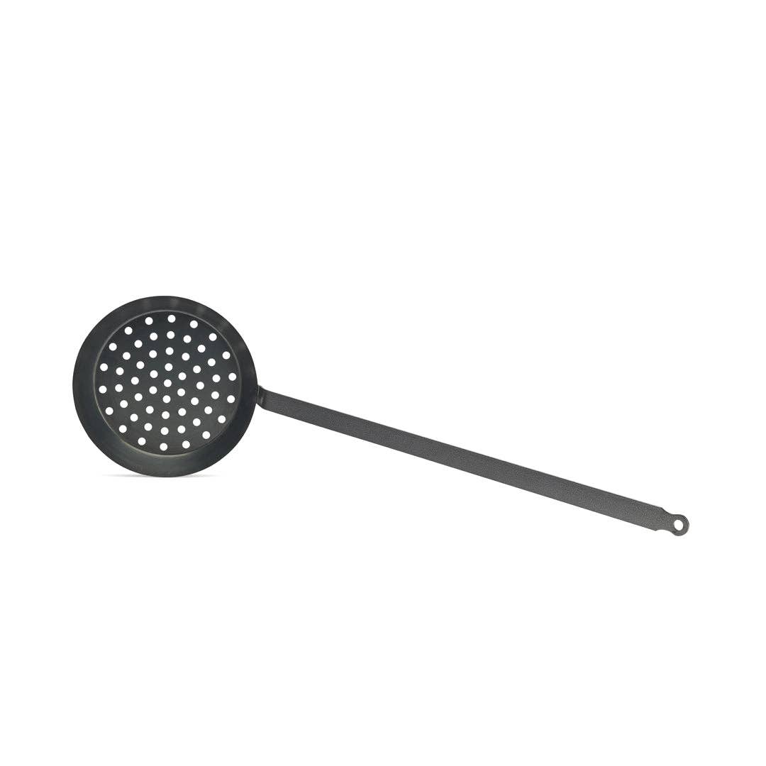 Black perforated pan  on a white background