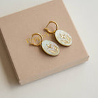 Celestial Seaweed Oval Hoop Earrings: Pearly - lemon - acrylic - with - gold - All Good Things