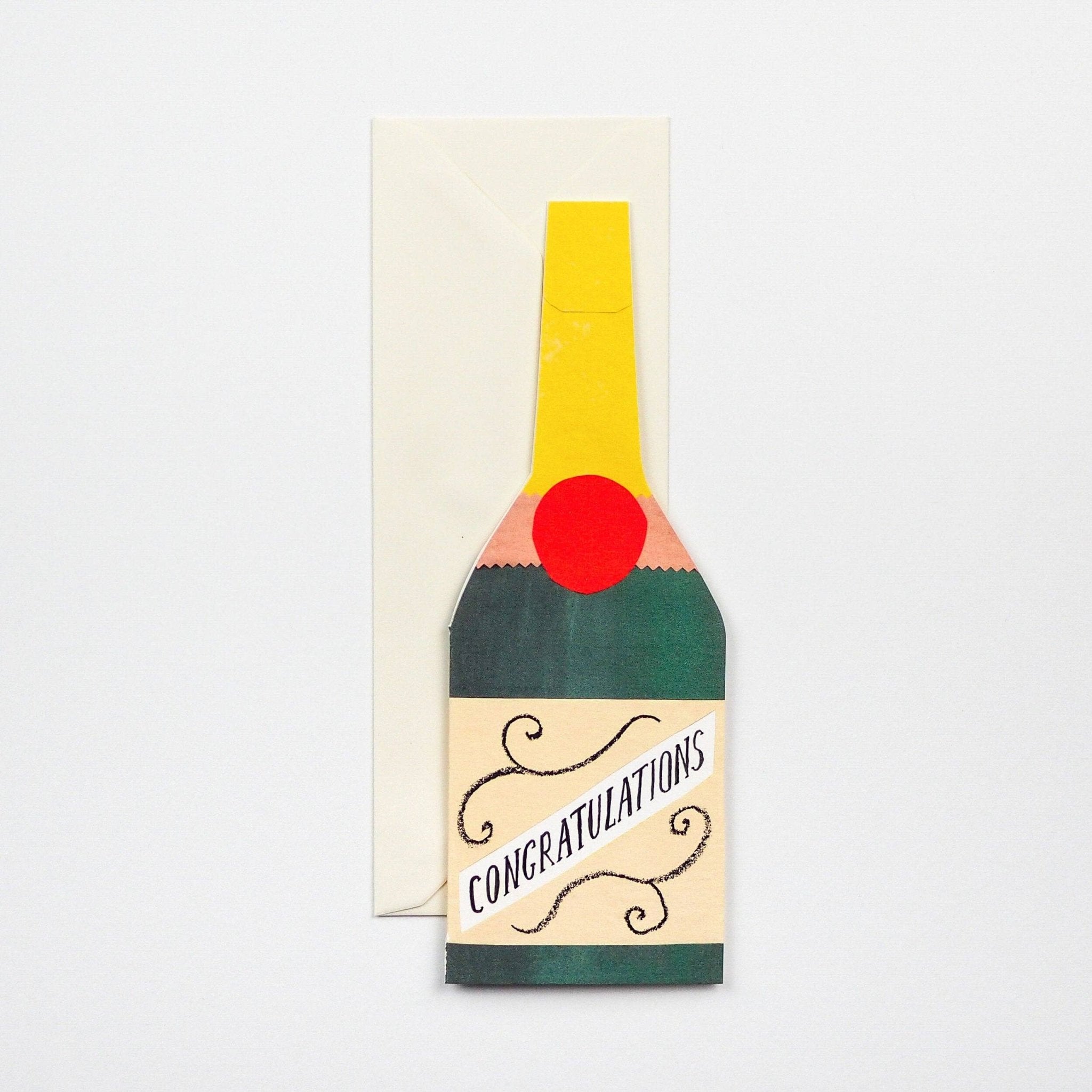 Tall rectangular greetings card featuring champagne bottle design on a grey background - All Good Things