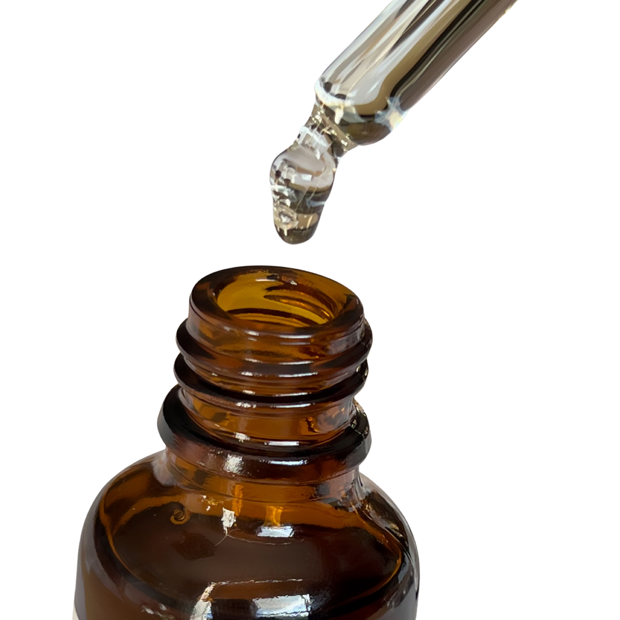 Brown glass dropper bottle with clear liquid being dispensed on a white background
