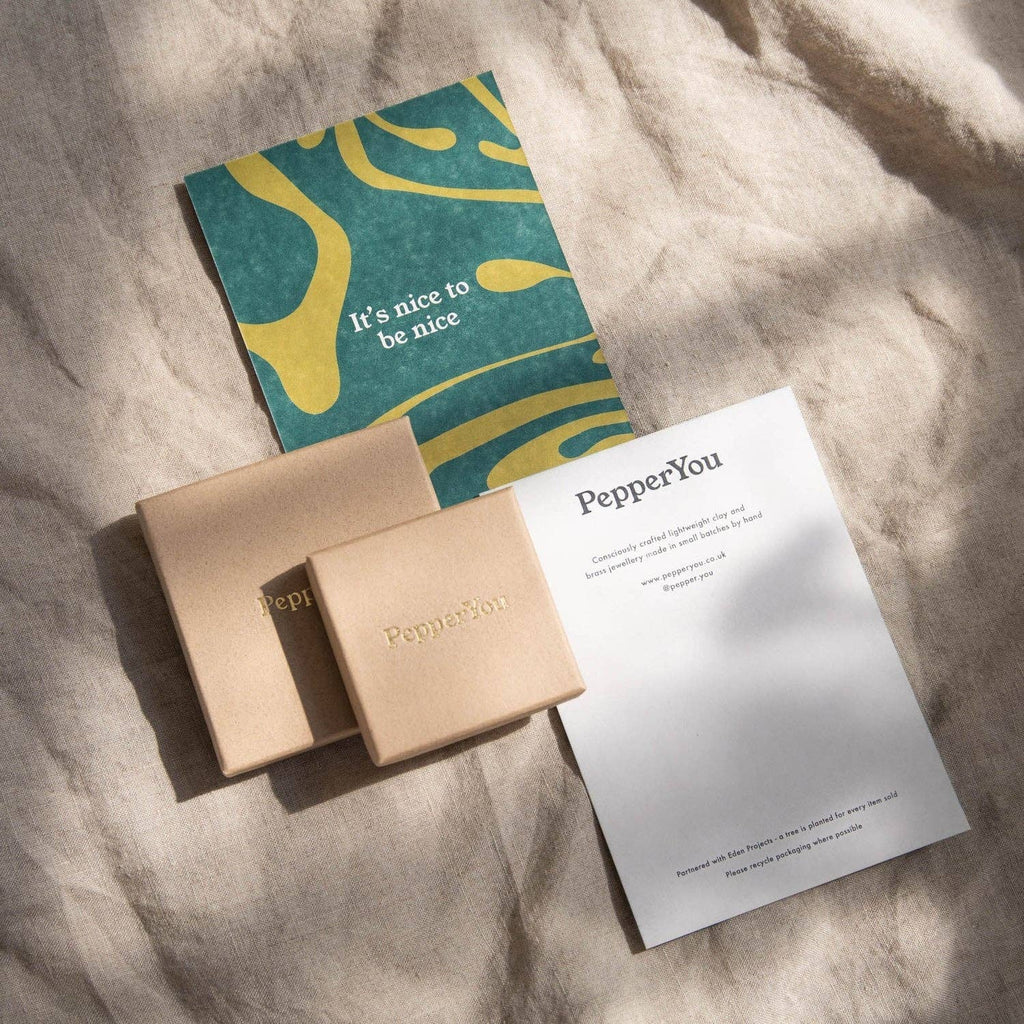 Product packaging with 'PepperYou' branding on a textured surface