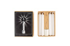 Set of white candles in a wooden box with a black and white illustration on the lid.