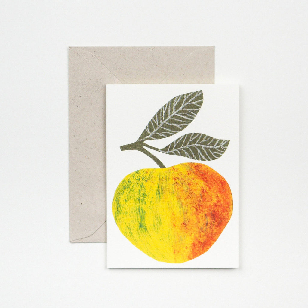 Greeting card with a yellow and orange fruit design on a white background