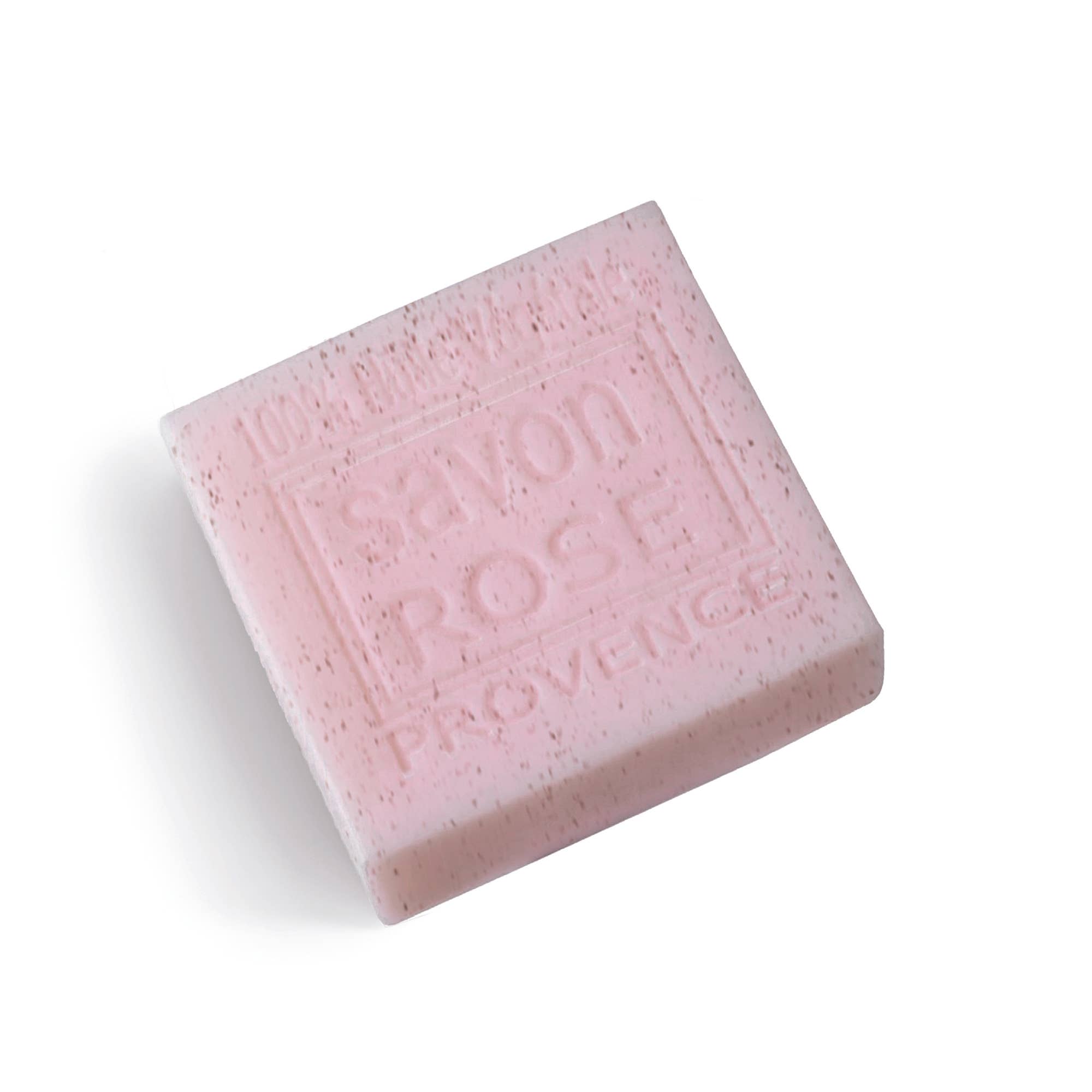 Pink bar of soap on a white background