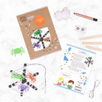 Spider web craft kit with materials and instructions on a white background
