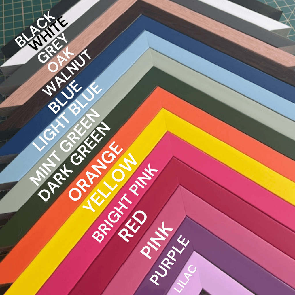 A selection of colourful Polcore picture frames arranged in a geometric rainbow chevron shape - All Good Things