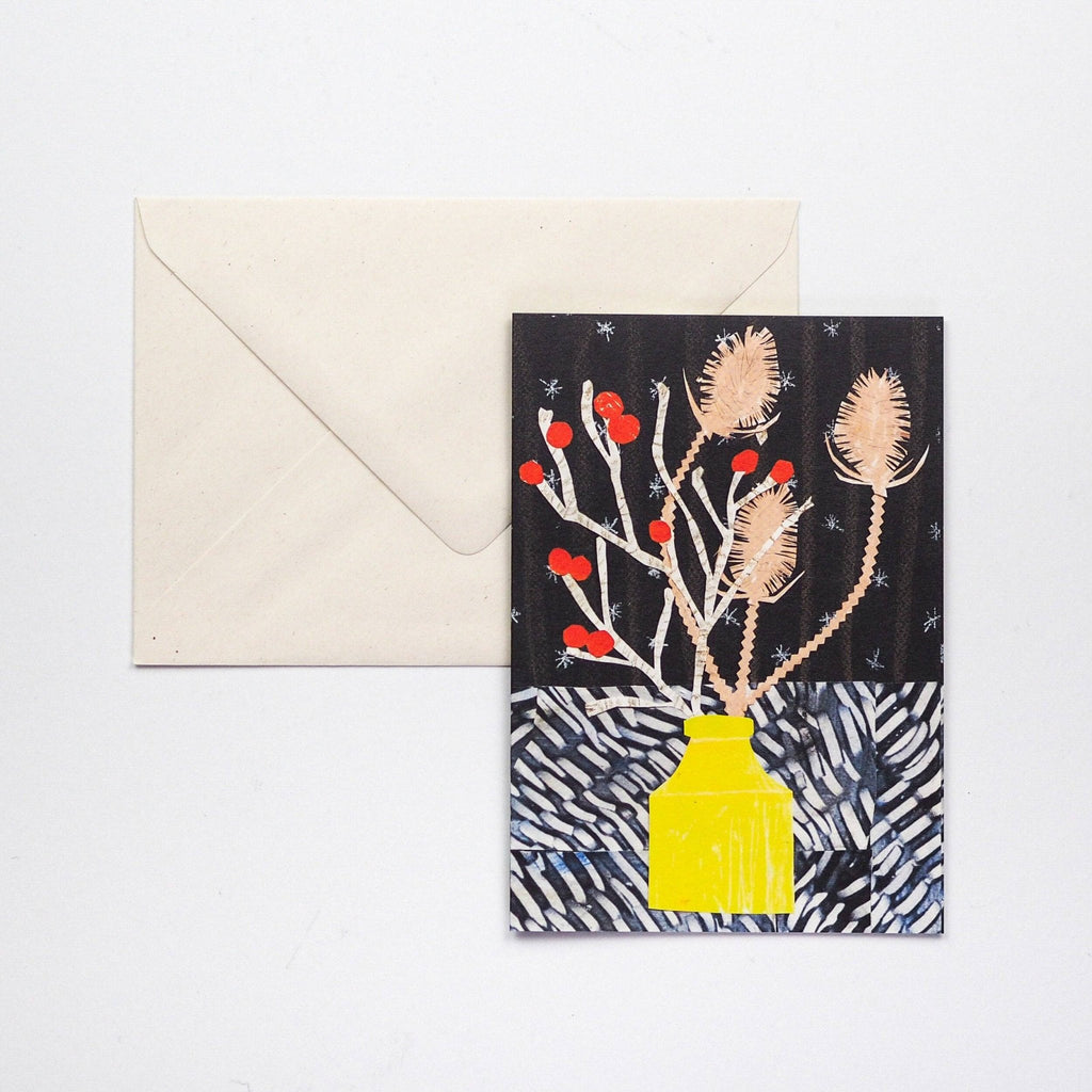 A greetings card featuring a stylised bouquet of winter berries and teasels in a yellow vase - All Good Things